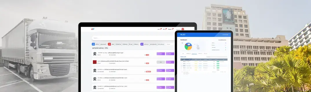 A freight booking site and its dashboard open on a tablet and a laptop, a haulage truck behind them