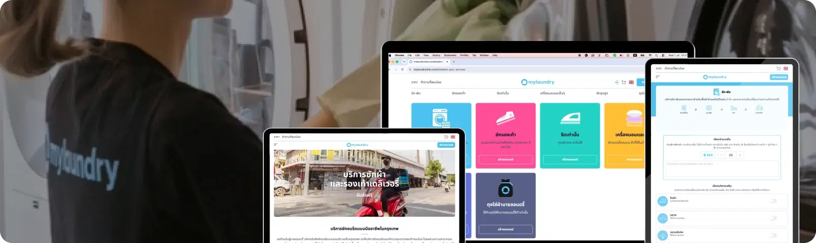 A mylaundry staff member at work, with the site open on a laptop, tablet and phone